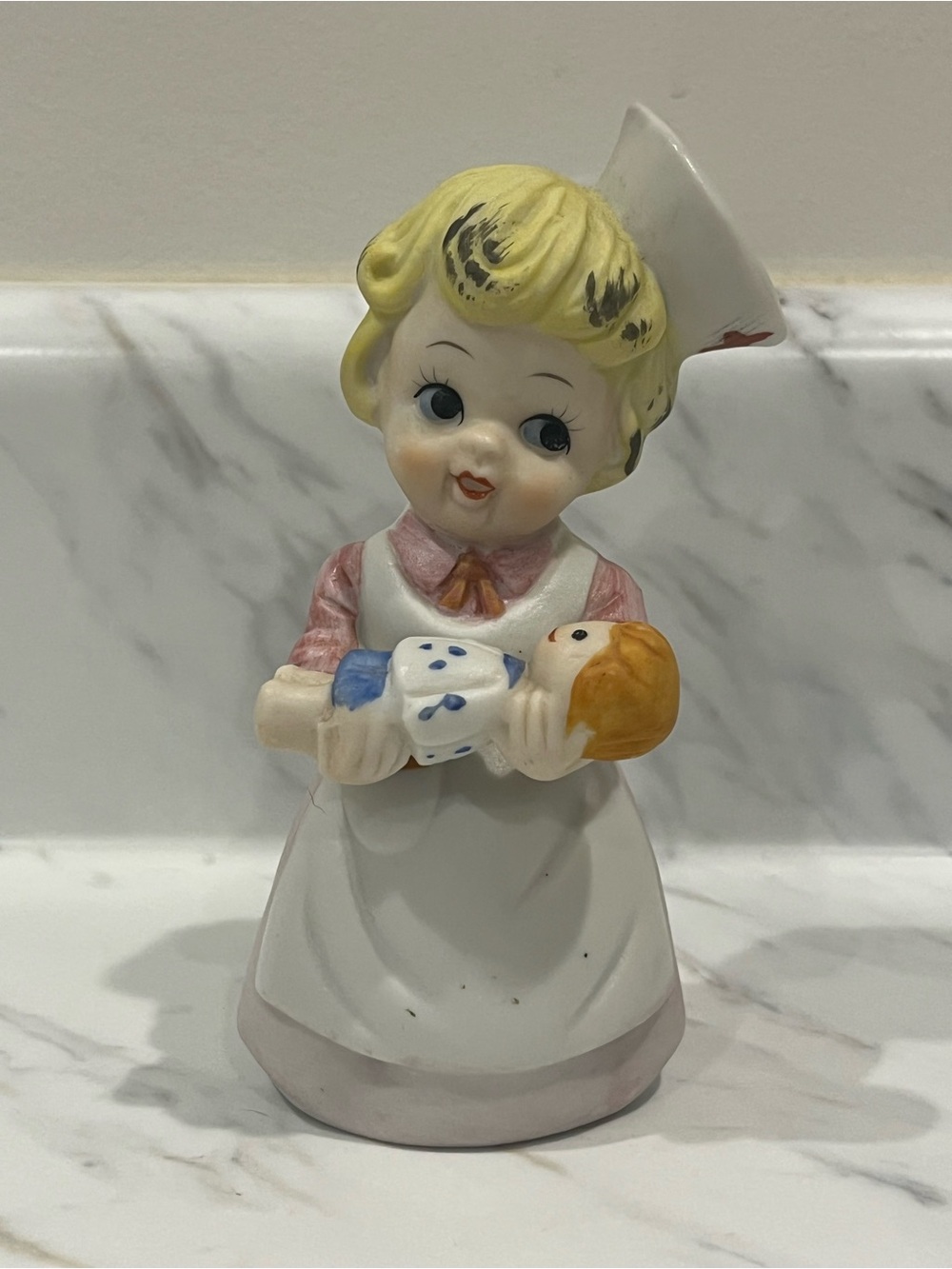 Vintage Ceramic Nurse Figurine in White and Pink
